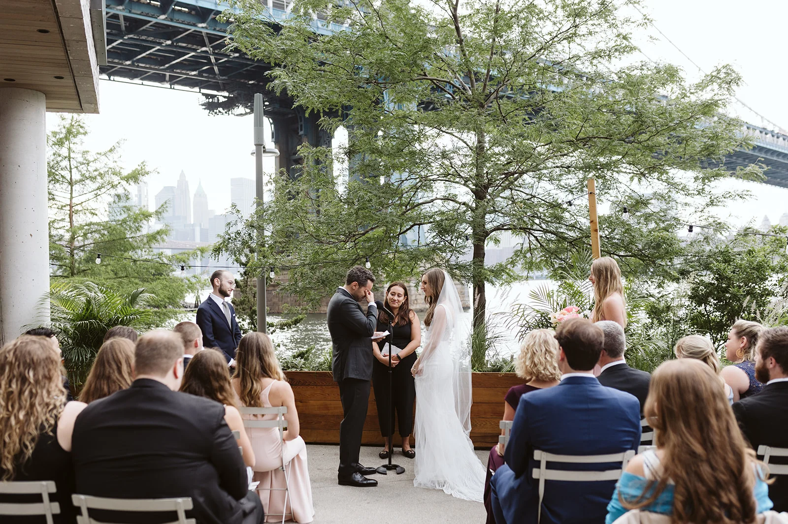 Celestine Brooklyn wedding venue with Manhattan Bridge and East River views.