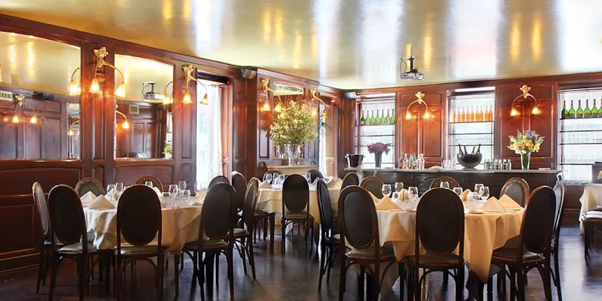 Elegant French brasserie Orsay NYC, featuring a cozy private upstairs wedding space.
