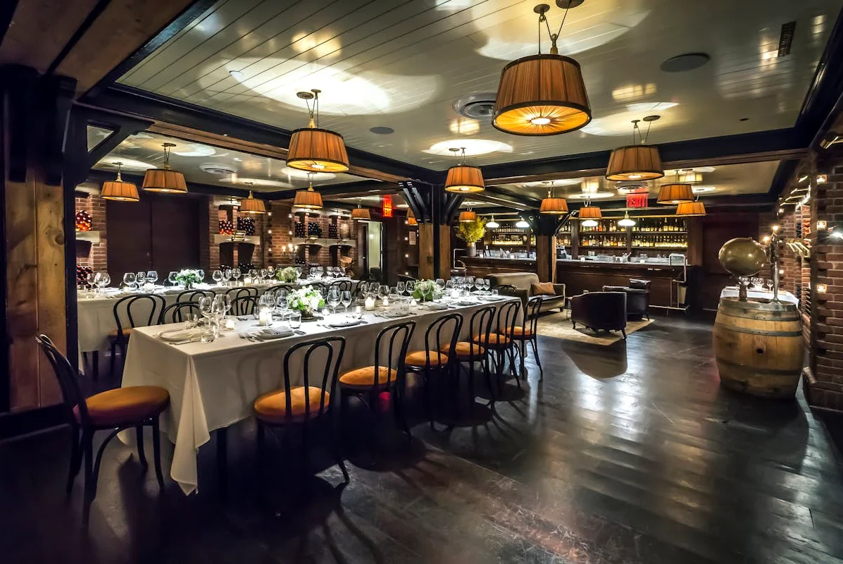 Lafayette NYC Cave du Vin, a cozy wine cellar wedding space with candlelight.