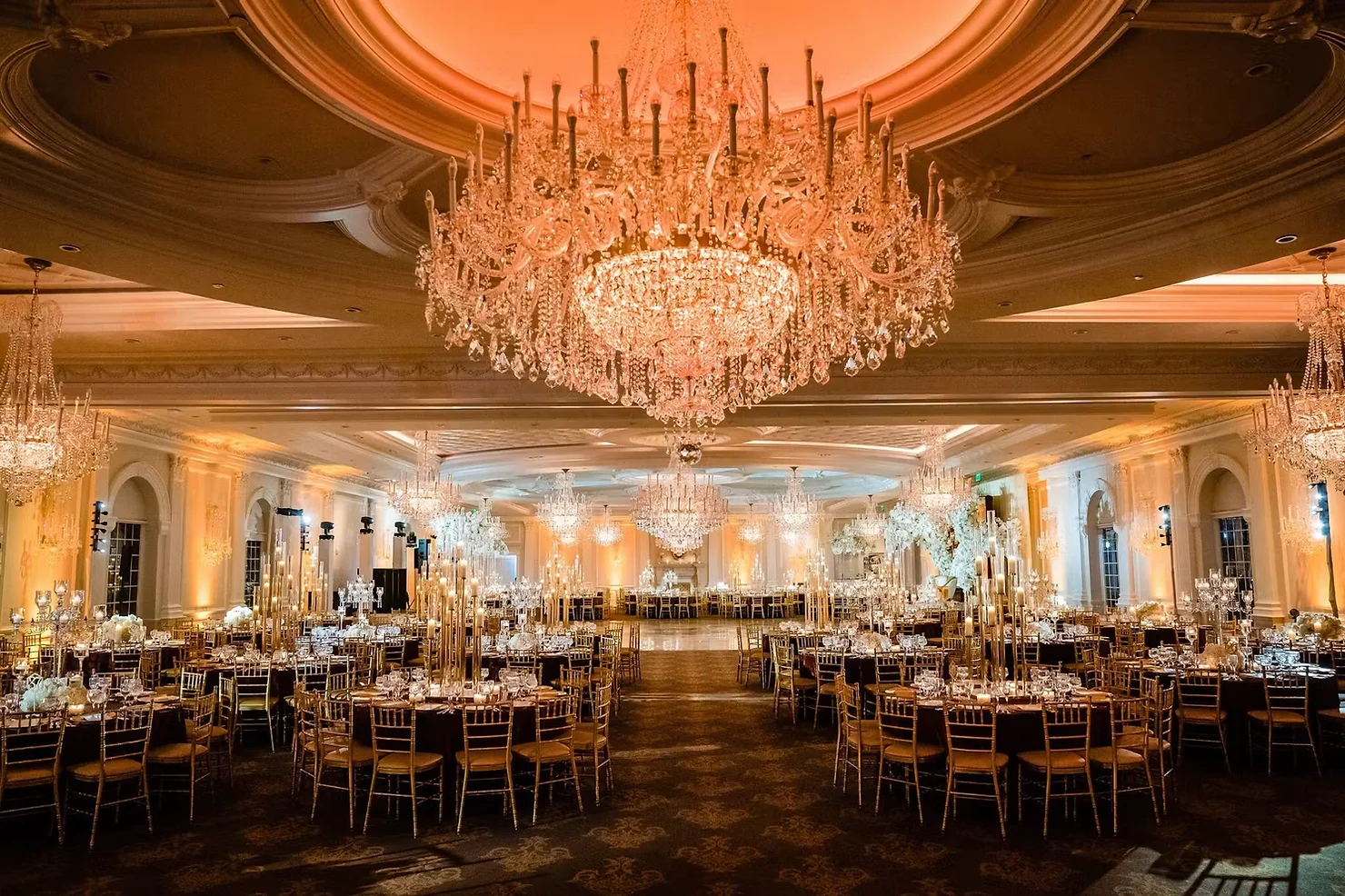 nyc wedding dj bergen county dj big chandeliers in a ballroom at The Rockleigh
