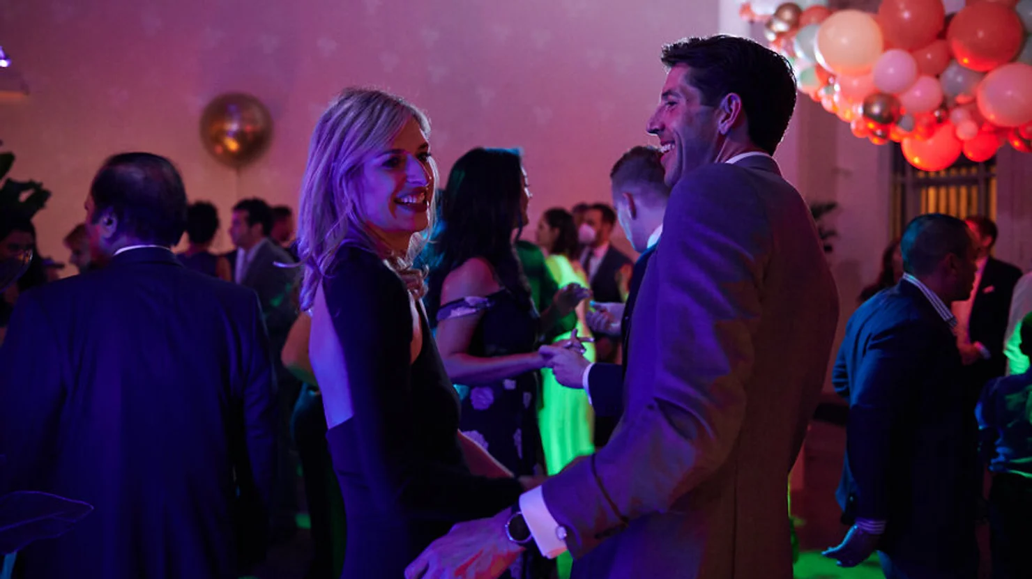 Couple dancing to DJ at wedding